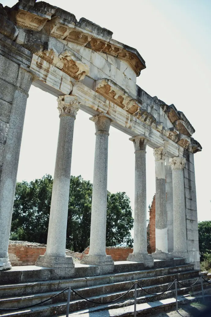 A large stone structure with many columns